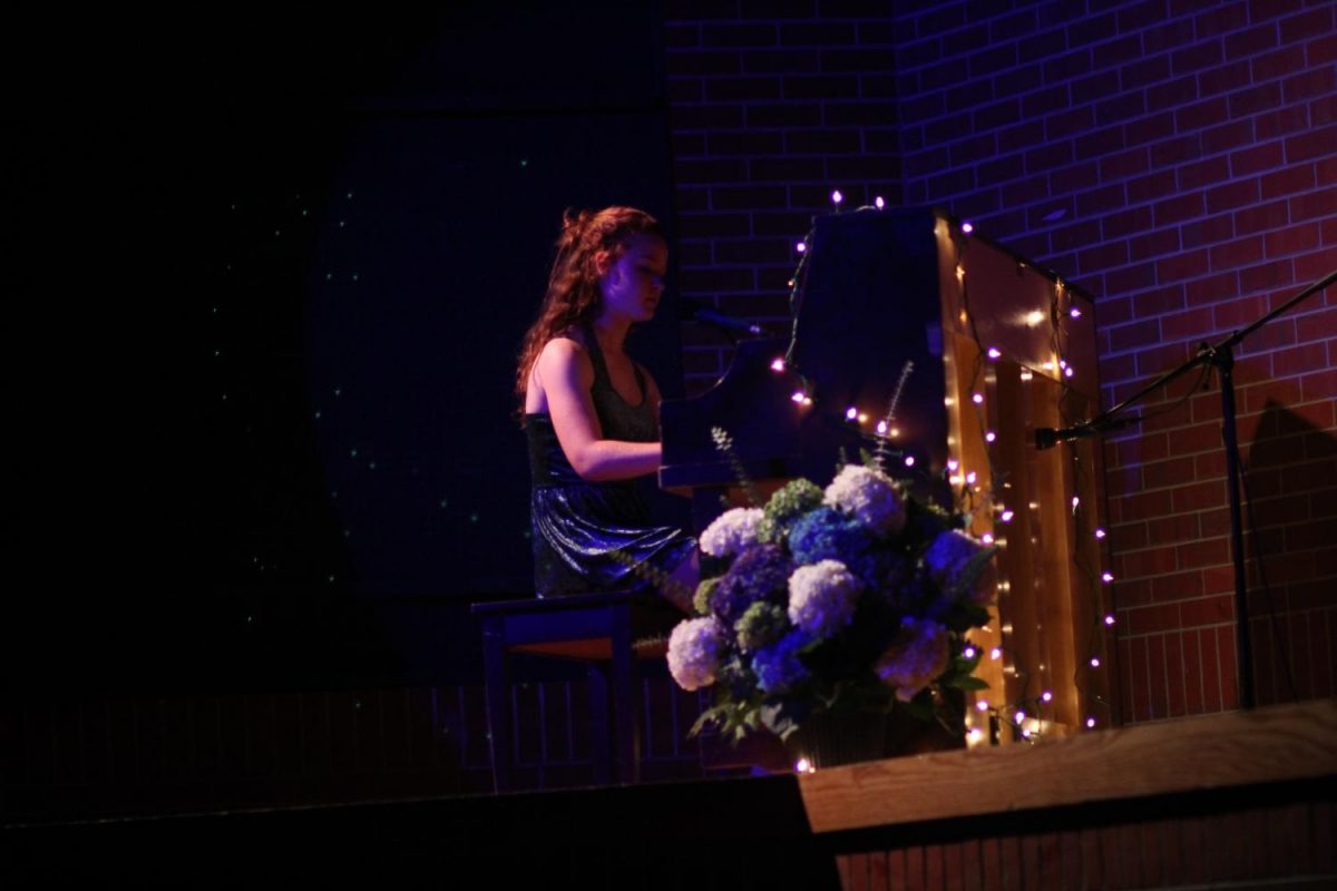 Emma Purcell Sings and plays piano.