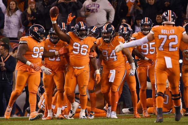 DENVER, CO - NOVEMBER 25: Shelby Harris (96) of the Denver Broncos celebrates an interception in the end zone during the fourth quarter against the Pittsburgh Steelers. the Denver Broncos won 24-17. The Denver Broncos hosted the Pittsburgh Steelers at Broncos Stadium at Mile High in Denver, Colorado on Sunday, November 25, 2018. (Photo by Joe Amon/The Denver Post)