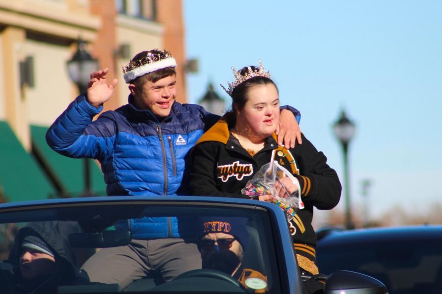 Saturday, November 2nd: Homecoming King Noah Stokes (12) and Homecoming Queen Khrystya Gordon (12) wave at the crowd during Arapahoes annual Homecoming parade.