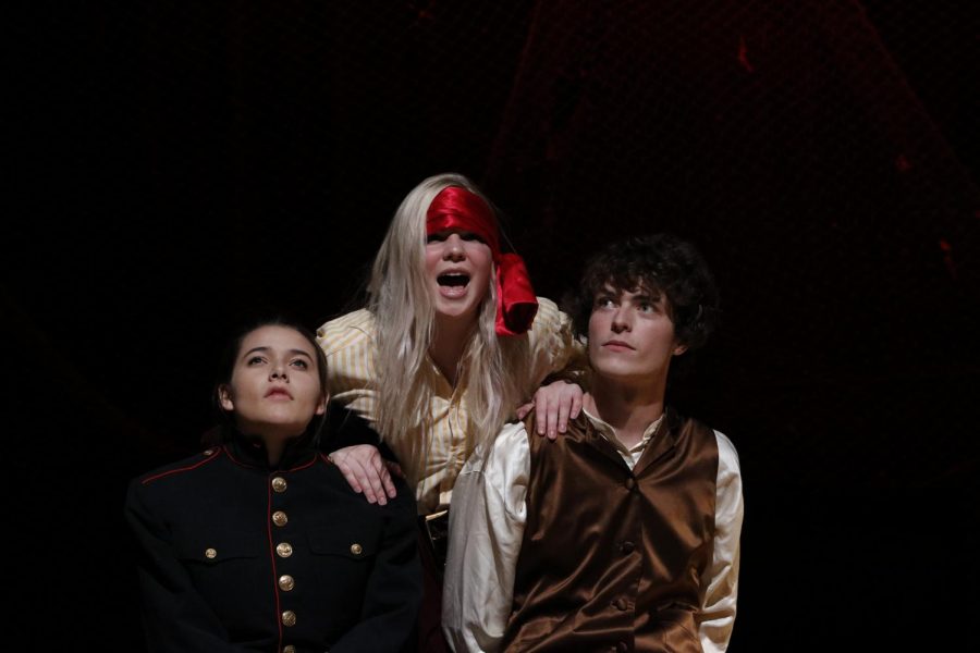 Beebe (middle) acts alongside Ellie Olsen, 12, and Ethan Lahm, 12, in the fall play Peter and the Starcatcher.