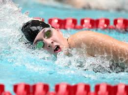 Junior Nicole Seavall, swimming the 500 Freestyle