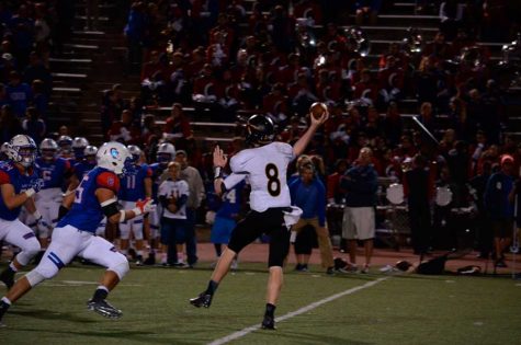 Quarterback Connor Desch throws a pass against Cherry Creek on Thursday night.