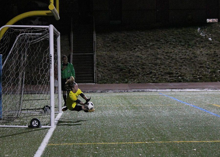 Sophomore Spencer Cobb saves one of  two penalties to lift Arapahoe above the Raiders