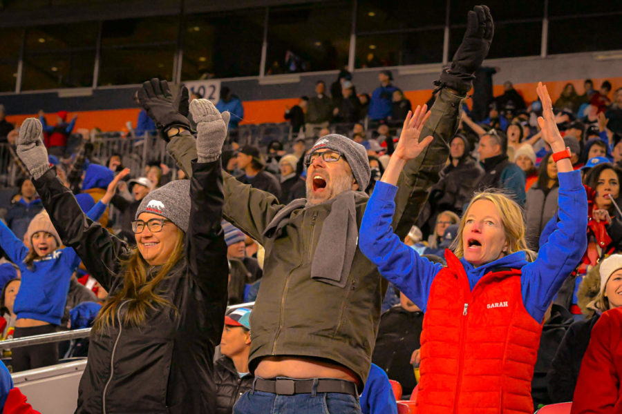 Singing and dancing along to “Y.M.C.A.” by Village People, Cherry Creek football parents enjoy their time together. Enthusiastic parents and students of Cherry Creek and Valor Christian football players packed the stands at the 5A State Football Championship Game held at Empower Field at Mile High on December 3rd, 2022. “It is very electrifying to have people who want to watch us play and to watch us go do what we love,” said Cherry Creek player Junior Exodus Johnson.